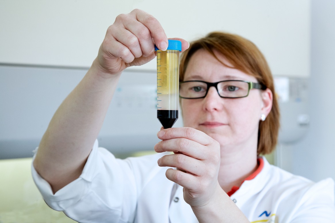 Lab technician preparing personalised cancer vaccine